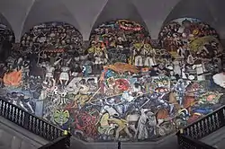 Mural by Diego Rivera at the National Palace depicting the history of Mexico from the Conquest to early 20th century.