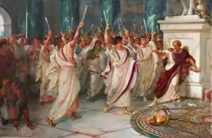 Man in brown and red being stabbed by men in white