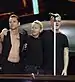 The band standing onstage