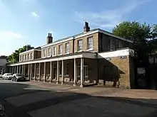 The Colonnade (houses and offices, just inside the main gate).