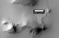 Possible dike in Syrtis Major quadrangle as seen by HiRISE under the HiWish program