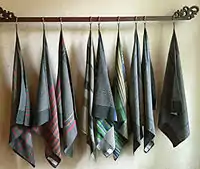 Dishcloths woven on the antique loom. Each cloth has a unique design, set by the weaver who completed the previous cloth.