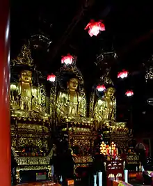 Amitābha (left), The Buddha (center), and Bhaisajyaguru (right)