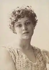 curly-haired woman