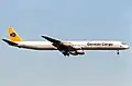 A German Cargo Douglas DC-8 approaches Frankfurt Airport in 1992.