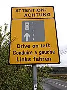 Sign reminding motorists to drive on the left in Ireland