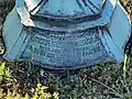 Close-up image of the plaque on the front of the Duffield Memorial's pedestal.