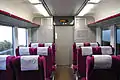 Intermediate level saloon at the end of a bilevel Green car in January 2012