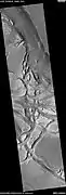 Wide view of Buttes and Mesas, as seen by HiRISE under HiWish program Location is Elysium quadrangle.