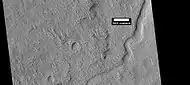 Channel with yardangs, as seen by HiRISE under HiWish program