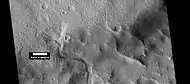 Channel that has cut through a crater rim, as seen by HiRISE under HiWish program