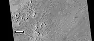 Cones, as seen by HiRISE under HiWish program.  These cones probably formed when hot lava flowed over ice-rich ground.