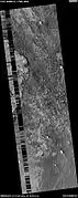 Wide view of layers in Schiaparelli Crater, as seen by HiRISE under HiWish program Part of the picture is degraded.  Parts of this image are enlarged in other images that follow.