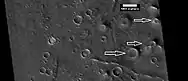 Cones, as seen by HiRISE under HiWish program  White arrows point to some of the cones.