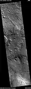 Channels that empty into a low area that could have been a lake, as seen by HiRISE under HiWish program
