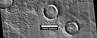Craters with layered mounds and tall, sharp rims, as seen by HiRISE under HiWish program