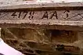 Back of a typical sculpture showing incised numbering system.