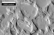 Another view of eroded terrain in Deuteronilus Mensae, as seen by HiRISE, under the HiWish program.