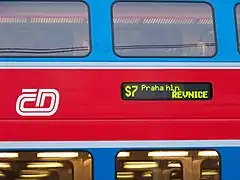 Destination and line number signs on public transport vehicles (a suburban train in Prague, Czech Republic)