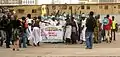 The banner of the Eyo Iga Opeluwa entering the TBS.