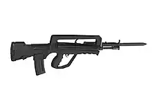 FAMAS-G2 with bayonetThe G2 features- a larger trigger guard- a redesigned magwell and magazine catch accepting STANAG magazines- a small hand-guard protrusion (bump) on the front of fore-stock under the muzzle- a 1/9 rifling, instead of the 1/12 rifling of the F1