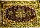 A Tabriz carpet with a fish design medallion