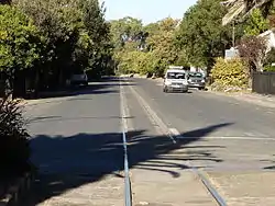 Fauresmith main street with the railway line along the centre