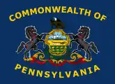 2007-2010 Proposal, adding the words "Commonwealth Of" to the top and "Pennsylvania" to the bottom of the flag in yellow silk, and arching the lettering around the Coat of Arms