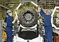 Lifting of a jet engine using a large engine crane