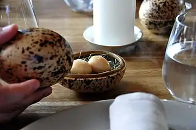 Pickled and smoked quail eggs.