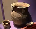 A large storage jar with cordmarked decorations and strap handles