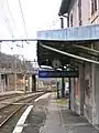 Gare de Fort l'Ecluse Collonges.  The clock works, although it's on summer time in winter.  In the left background, the Divonne line climbs away steeply