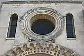 Romanesque oculus of the Église Sainte-Anne de Gassicourt, Mantes-la-Jolie, France
