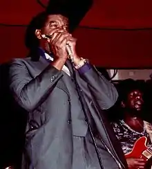 Image 12George "Harmonica" Smith, 1980 (from List of blues musicians)