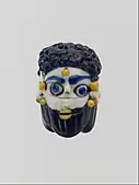 Face bead; mid-4th–3rd century BC; glass; height: 2.7&nbsp;cm; Metropolitan Museum of Art