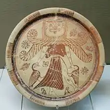 Winged goddess with a Gorgon's head, orientalizing plate, c.600&nbsp;BC, from Kameiros, Rhodes