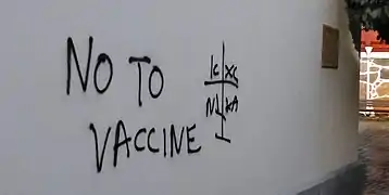 Graffiti with orthodox cross at the Catholic Church in Ystad 2021