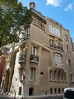 Facade of the Hôtel Guimard.  The studio of his wife was behind the large windows on the top floor.