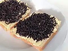Bread with butter and chocolate sprinkles