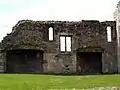 Site of abbey kitchens, with two fireplaces prominent.