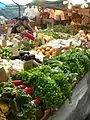 Merchant arranging produce, 2008