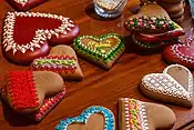 Hearts shaped Valentine's Day cookies adorned with icing.