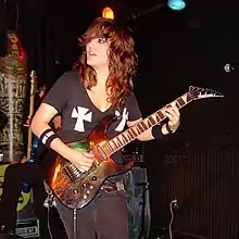 Heather Baker performing with The Iron Maidens