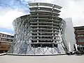 Gen Coel Building houses a public library, shopping, and community centre in Heerlerheide, Heerlen, Netherlands.