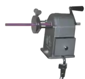 Hand-cranked planetary sharpener with spring-driven pencil holder. The small knob behind the crank is a sharpness regulator.