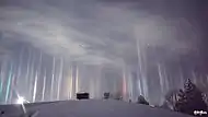 Light pillars caused by artificial lights, over North Bay Ontario, Canada