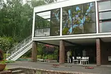 stairs to the balcony next to the dining room