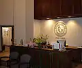 Reception desk, with Univ. of Phoenix logo