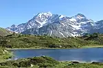 Lake Hopschu and Mount Fletschhorn in summer time.