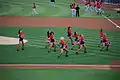 The dance team performing on the field